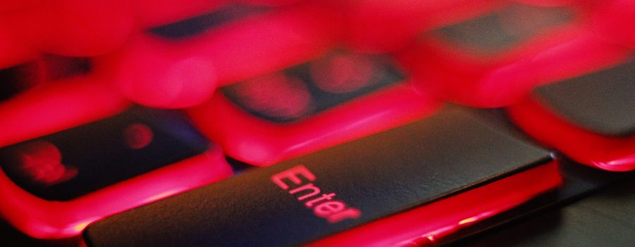 a close up of a red and black keyboard